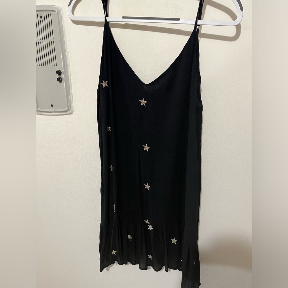 Black dress with gold stars